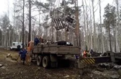 Обломки упавшего под Иркутском Ан-12 вывозят с места авиакатастрофы